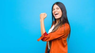 Happy woman pumping fist