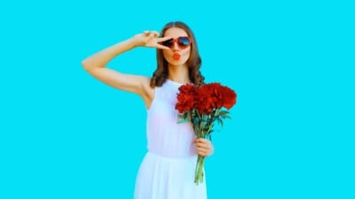Woman with red roses
