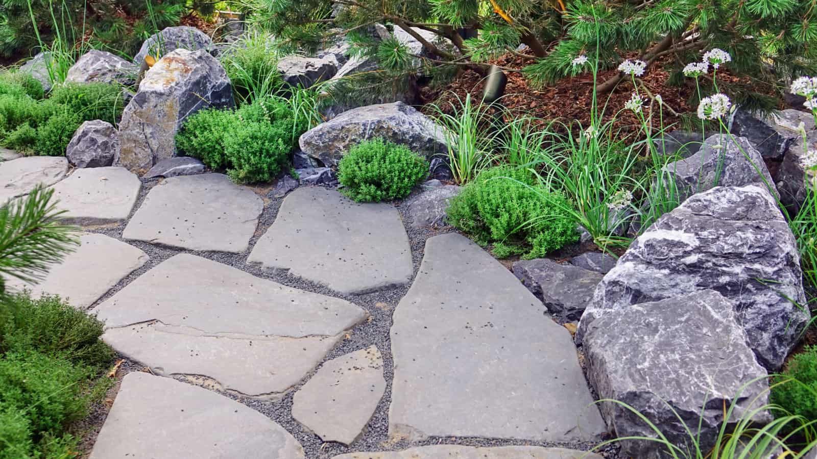 Paver pathway next to landscaping